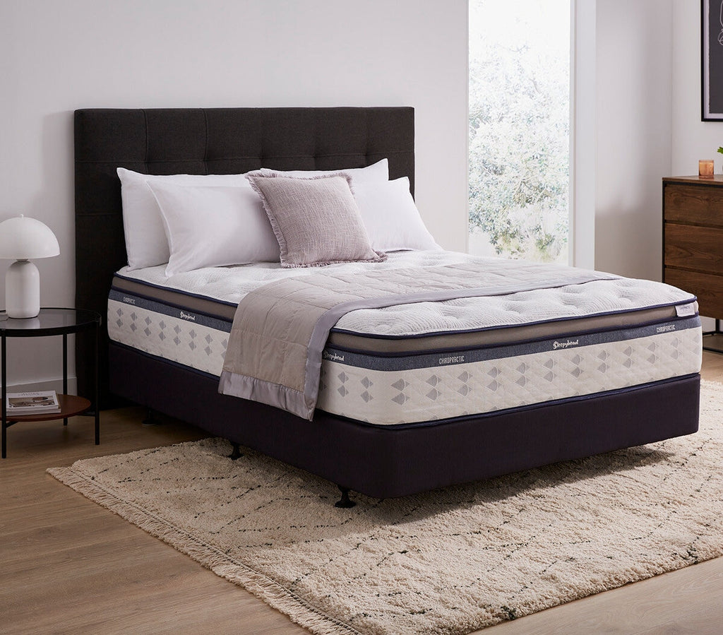 Sleepyhead chiropractic bed with mattress and pillows in a bedroom setting