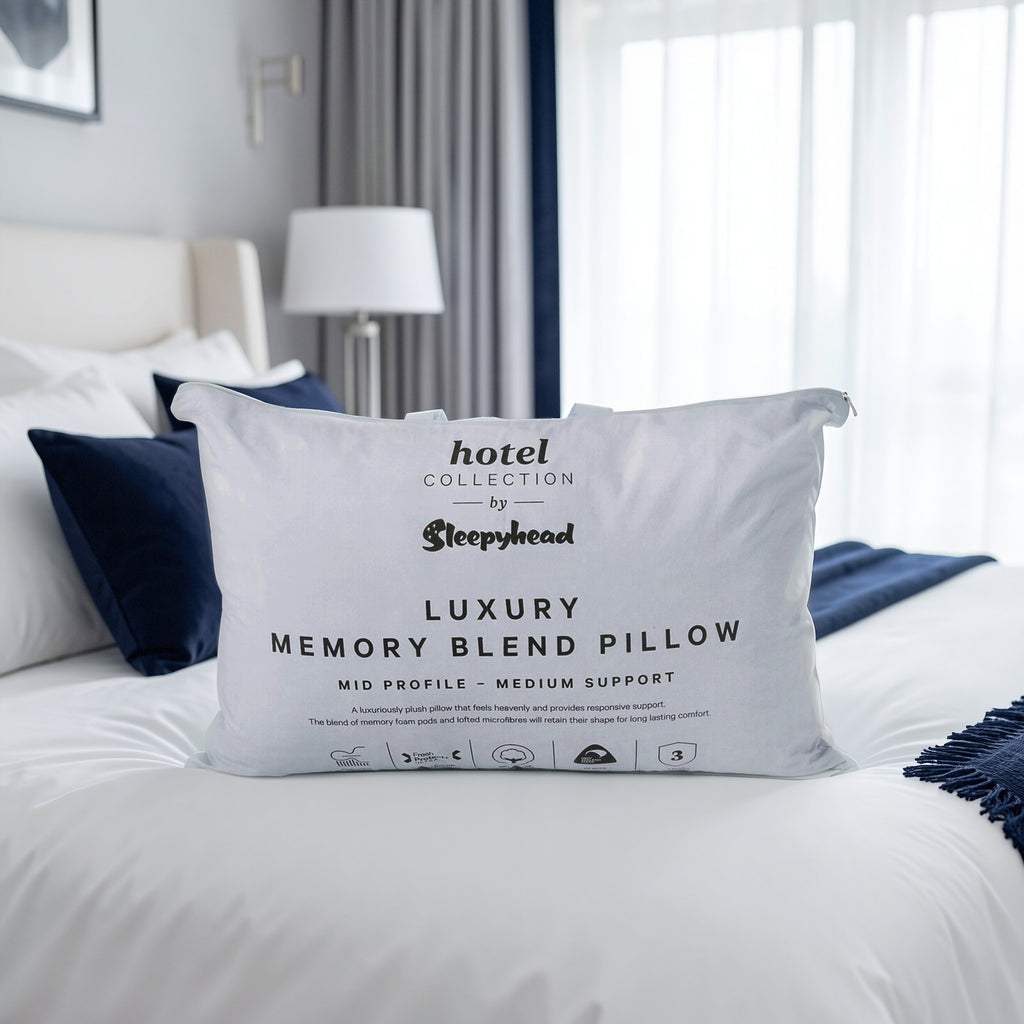 Sleepyhead luxury memory blend pillow on a bed in a bedroom setting