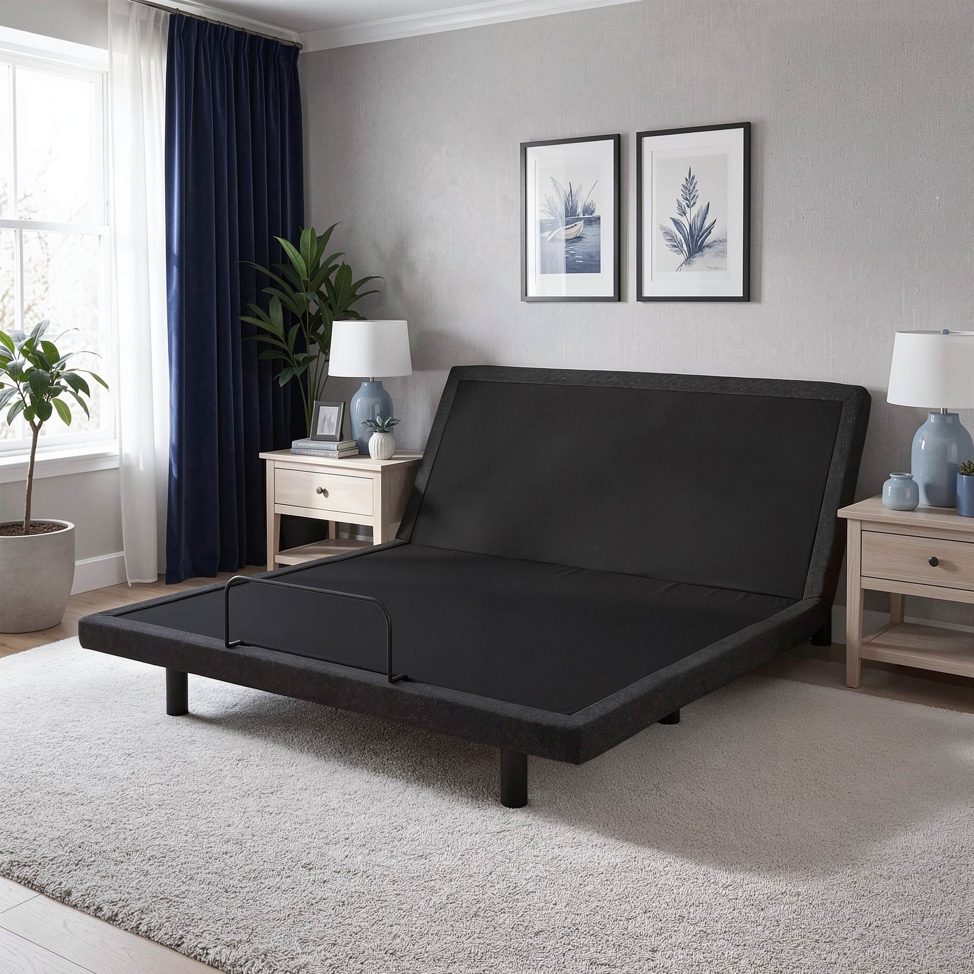 Black Sleepyhead Delta adjustable bed in a bedroom setting with decor elements.