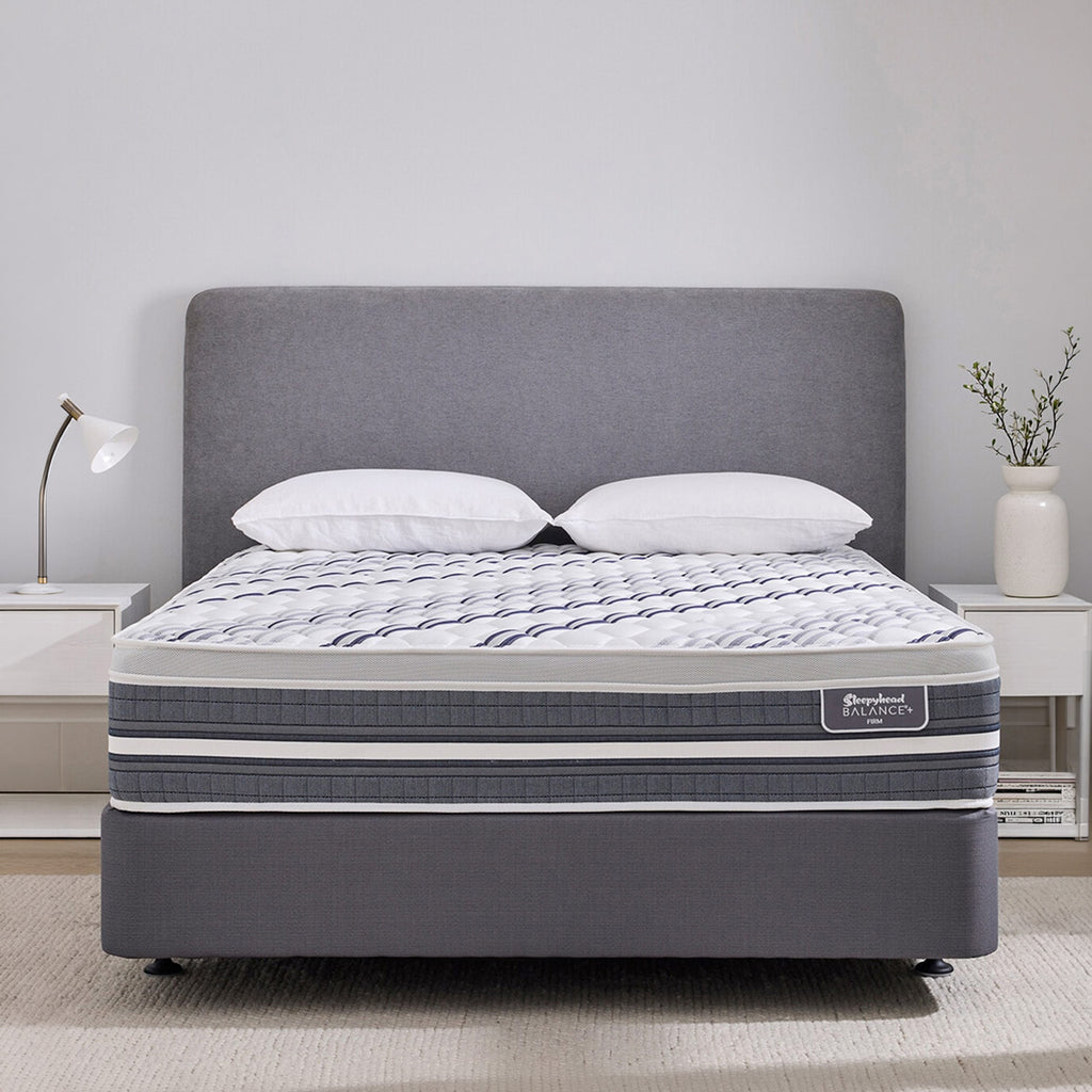 Grey Sleepyhead Balance+ bed with white pillows and a visible mattress brand in a bedroom setting