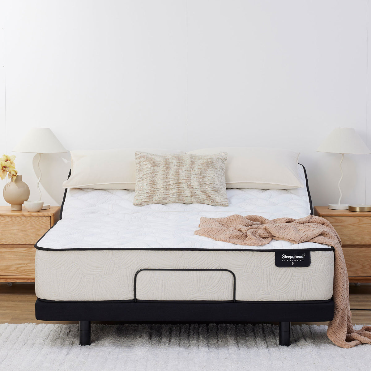 Sleepyhead Flexirest mattress and bedding on an adjustable base in a bedroom setting