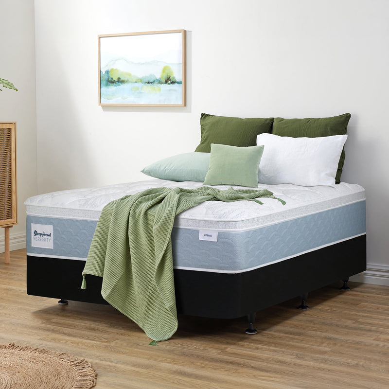 Sleepyhead Serenity bed with green bedding and pillows in a bedroom setting